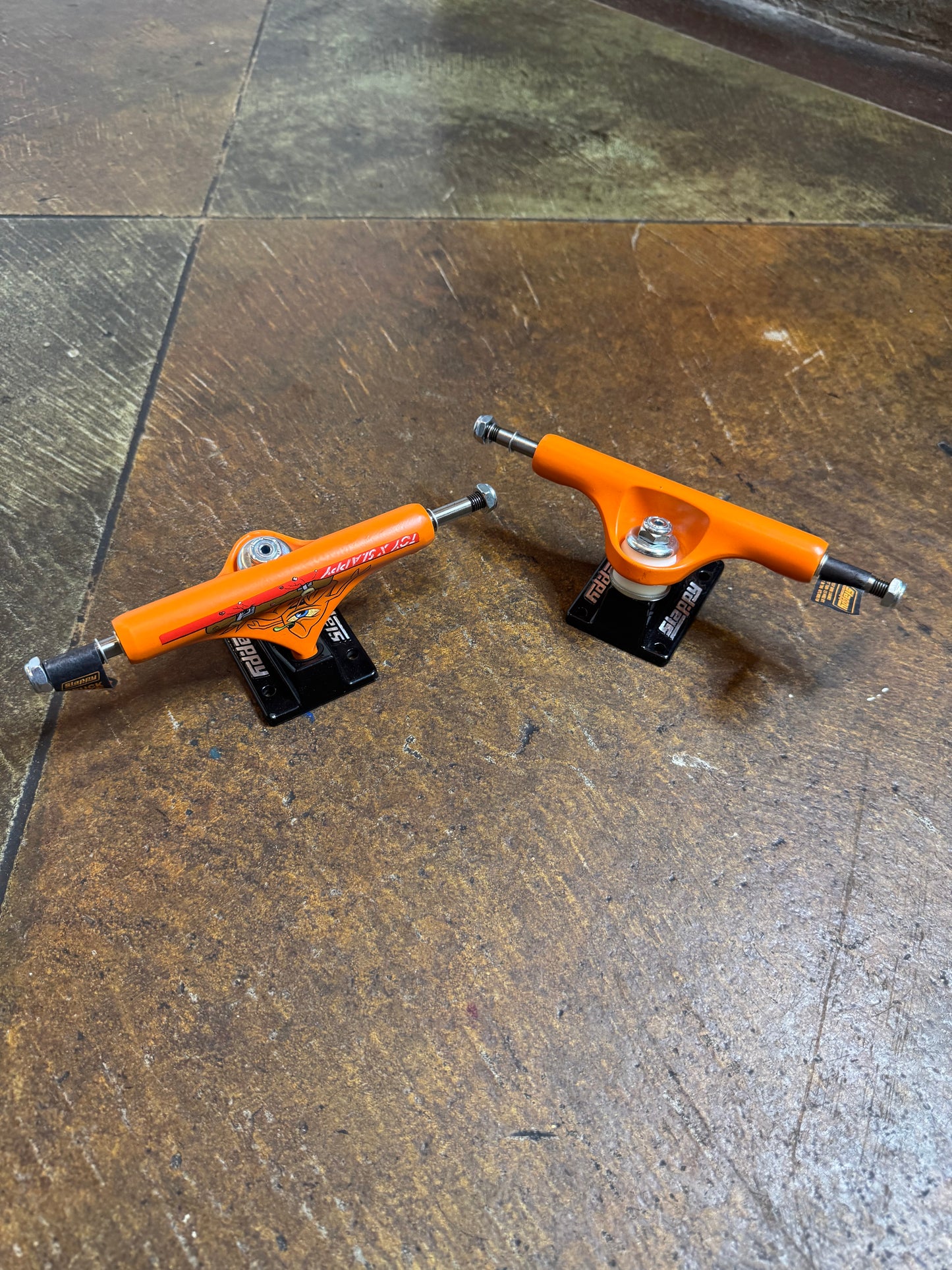 Toy Machine X Slappy ST1 Hollow - Orange/Black Trucks